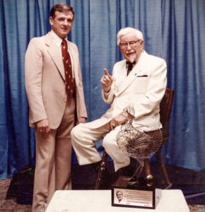Pat Grace with Colonel Sanders at a Restaurant Association Show in Chicago, Illinois in May 1978.